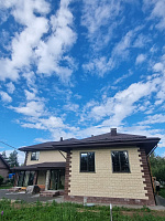 Дом из керамзитобетонных блоков 450 м² с облицовкой - детальное фото