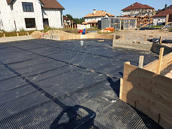 ФУНДАМЕНТНАЯ ПЛИТА С РОСТВЕРКАМИ Коттеджном поселке Петровское Барокко - СтройЛюкс