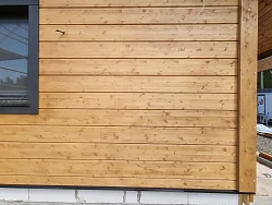 Отделка дома с гаражом имитацией бруса под ключ - СтройЛюкс