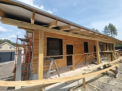 Отделка дома с гаражом имитацией бруса под ключ - СтройЛюкс